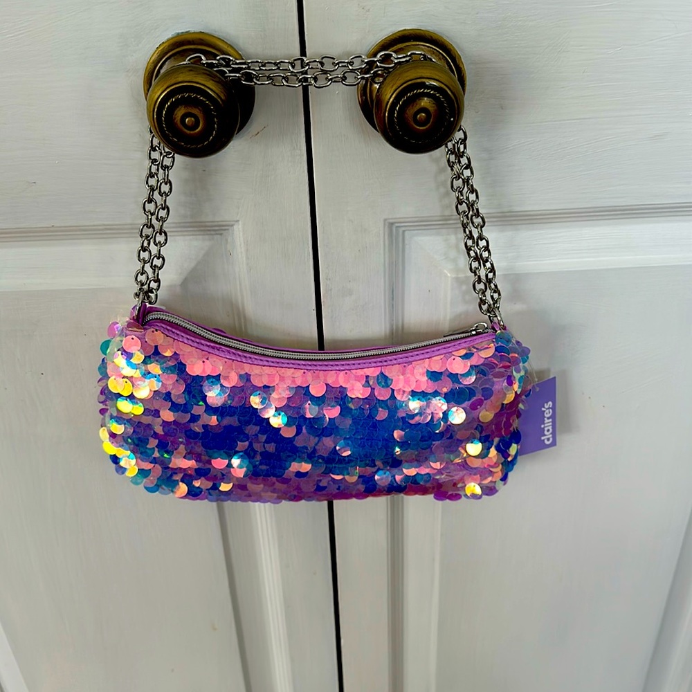 Crossbody with shoulder strap.  Carry it on its own or inside totes. - Picture 2 of 6
